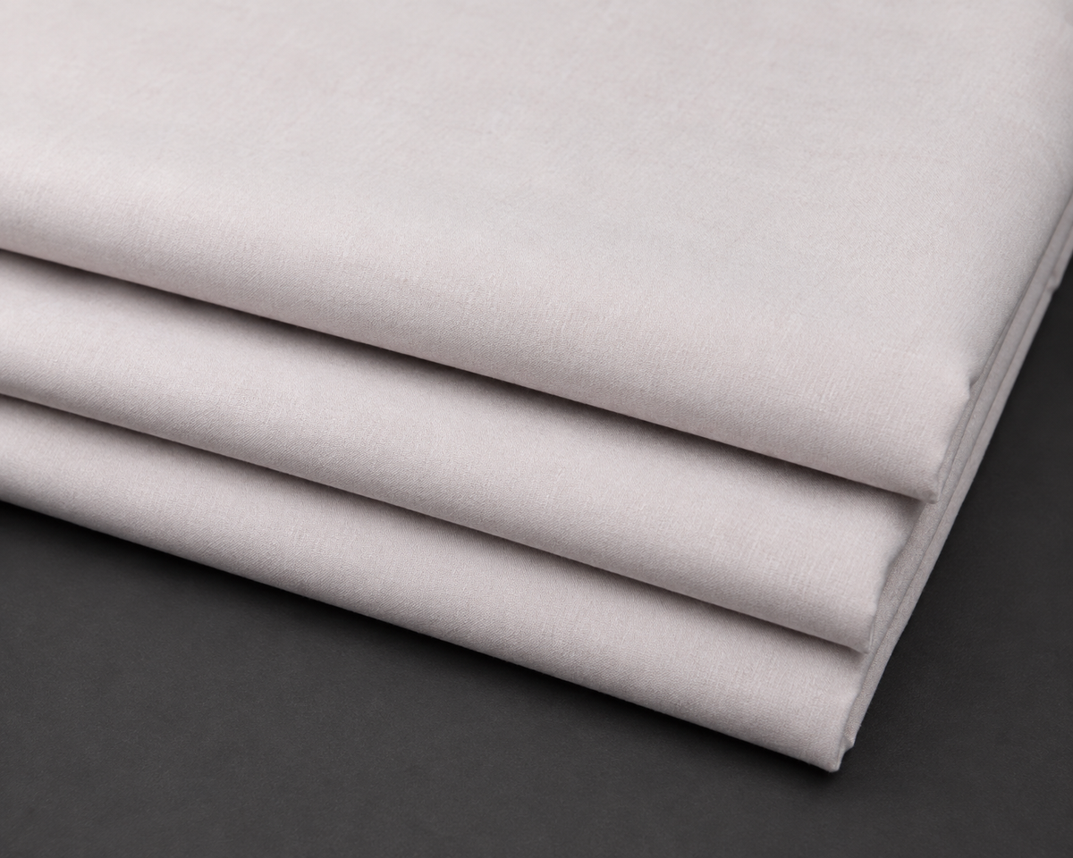 AW Aura Blended Wash & Wear fabric in Soft Blush Grey, folded fabric